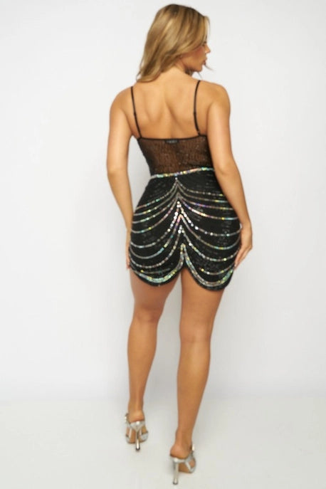 Robe moulante en résille avec strass